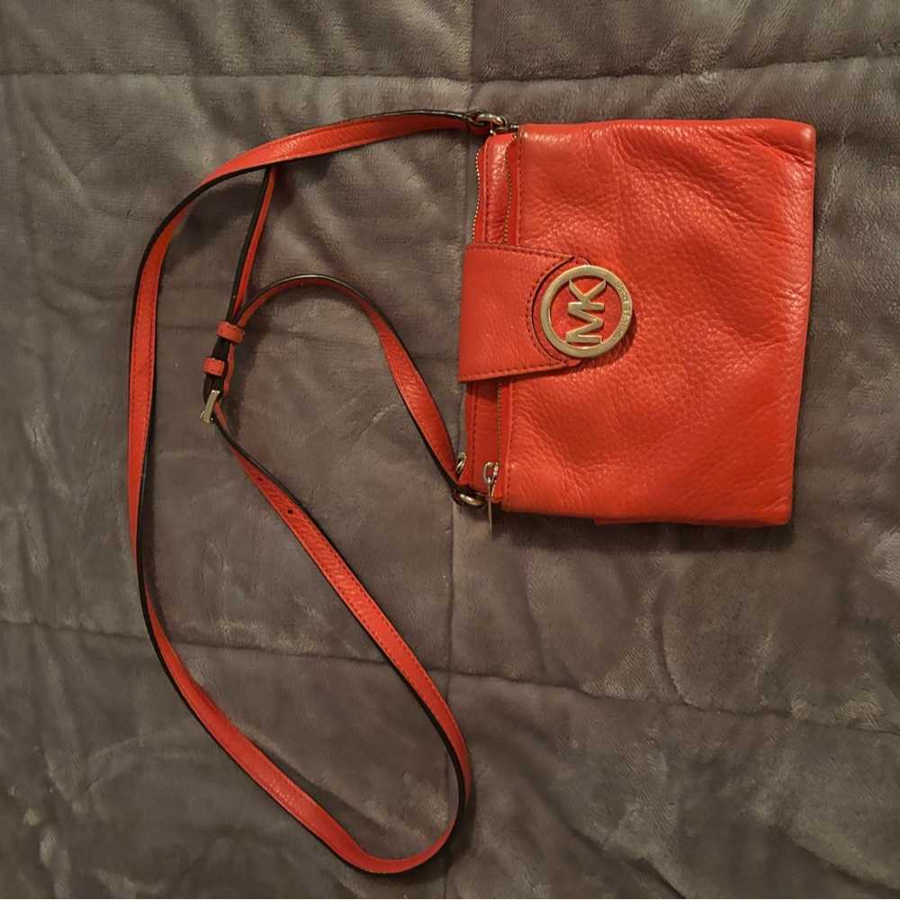 Michael Kors Orange Crossbody Bag with Gold Emblem